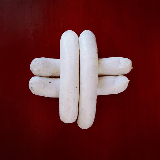 Saucisses de veau artisanales au lait frais et Tuber uncinatum.